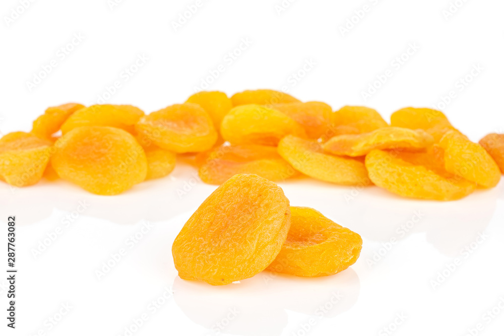 Lot of whole dried orange apricot isolated on white background Lot of whole dried orange apricot isolated on white background