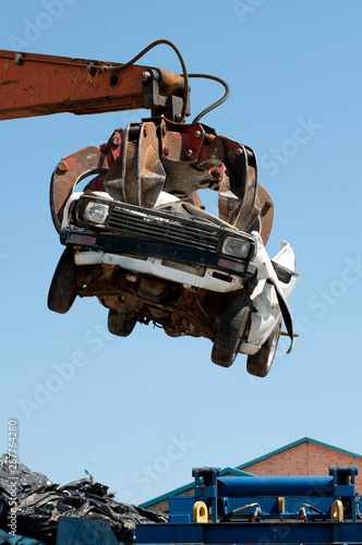 car crushing in crushing yard, destoy car, impounded, destroyed © Megan Paine