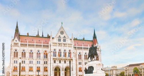 Budapest, Hungary government. Statue monument of Count Gyula Andrassy on the Parliament Square in front of Beautiful building of Hungarian Parliament in Budapest, popular Europe travel destination.