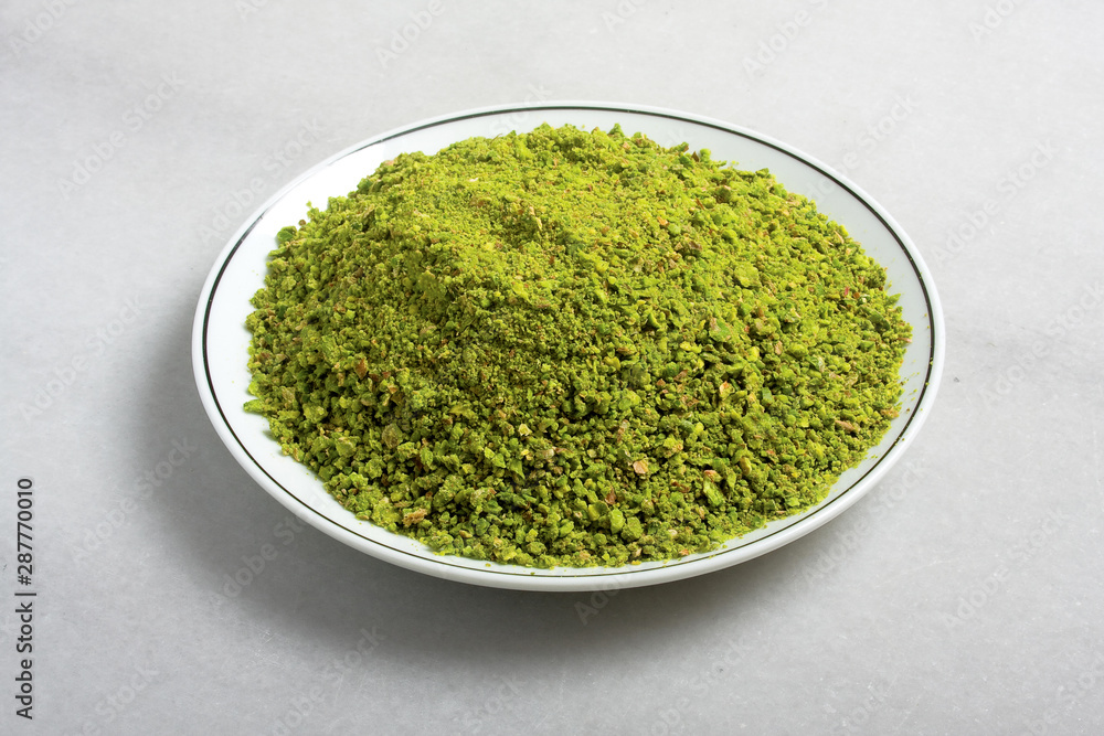 close up for grated pistachios close up for grated pistachios