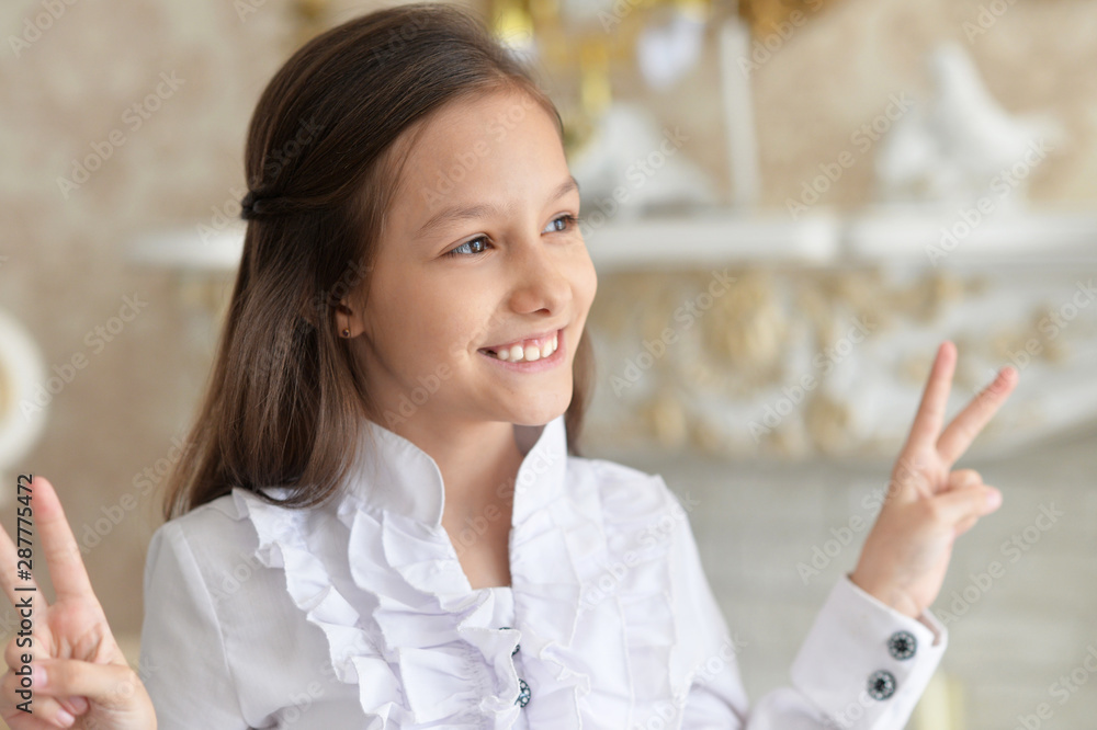 Portrait of emotional little girl in white blouse Portrait of emotional little girl in white blouse