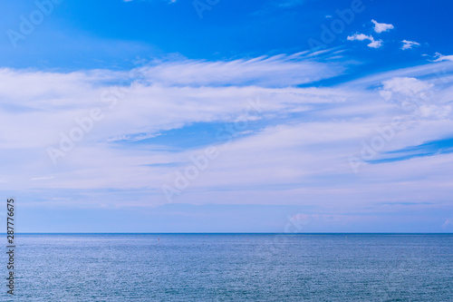 Minimalistic seascape under rhe blue sky.