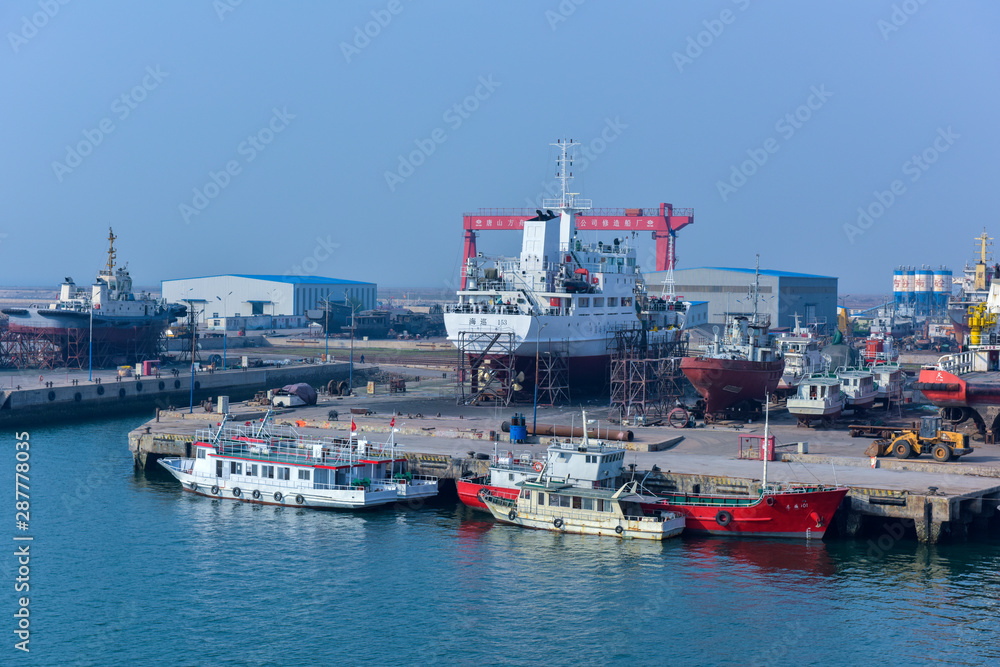 Luannan, April 29, 2018: ships on the coast pier, Tangshan, Hebei, China