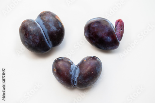Custom plums. Fruits in the form of human organs