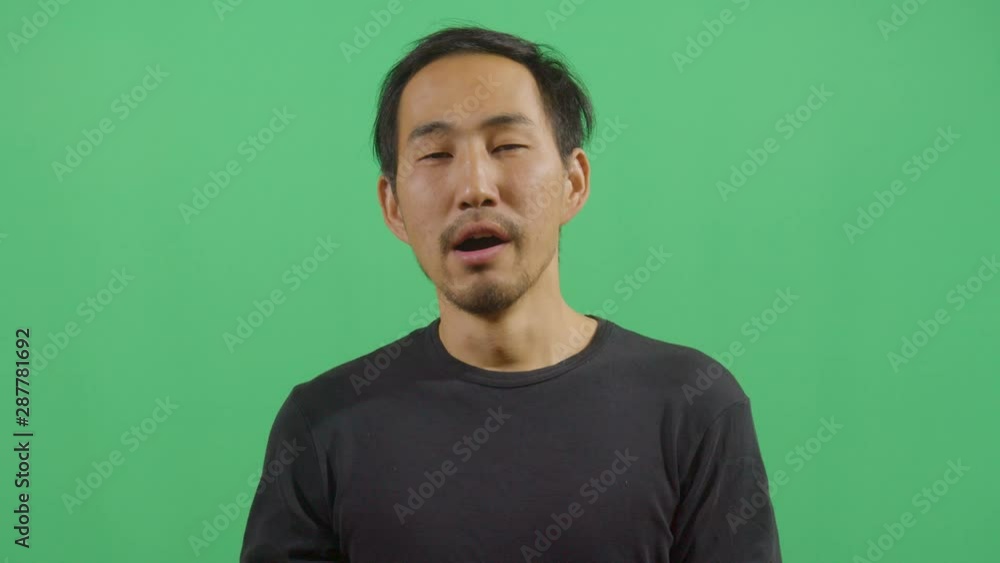 Adult Man Yawning Deeply Looking Into The Camera Adult Man Yawning Deeply Looking Into The Camera