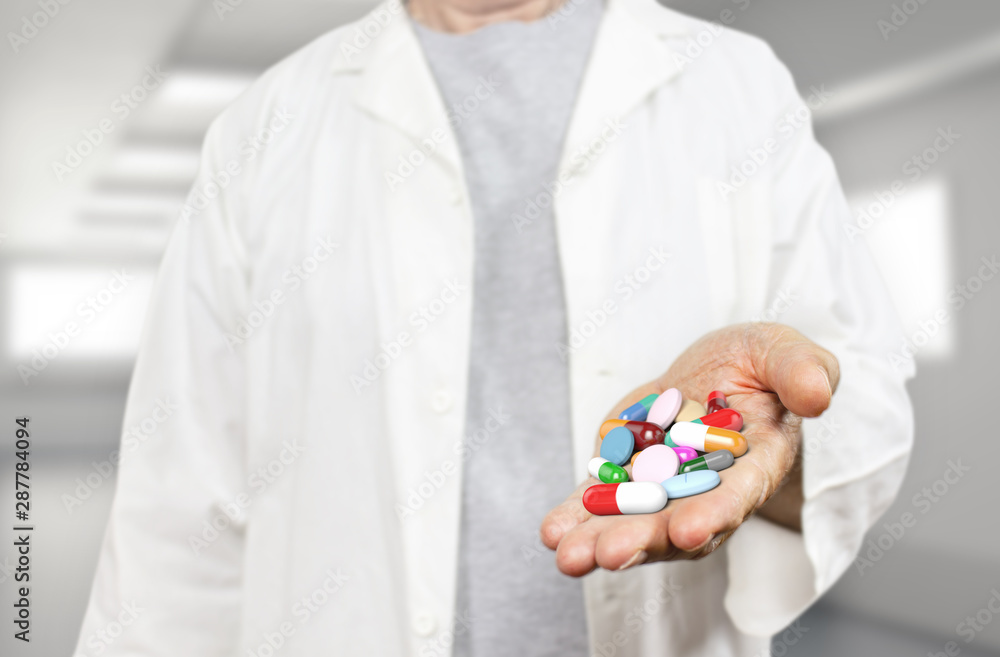 Old doctor holding pills, capsules, drugs and medics on a blurred hospital background 3d rendering. Medicine, health care, overmedication and disease healing concept. Old doctor holding pills, capsules, drugs and medics on a blurred hospital background 3d rendering. Medicine, health care, overmedication and disease healing concept.