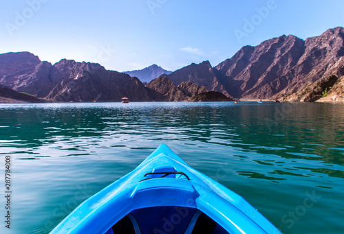 Boat ride kayaking at Hatta Dam awesome place to spend holidays beautiful mountain scenery 