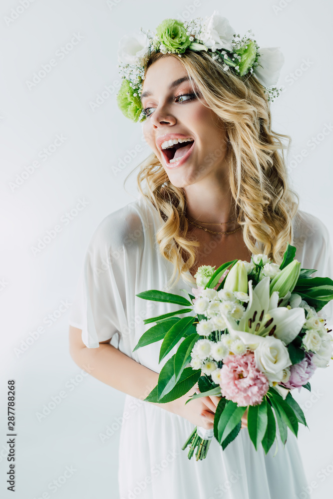 attractive bride in wedding dress and wreath holding bouquet isolated on white attractive bride in wedding dress and wreath holding bouquet isolated on white