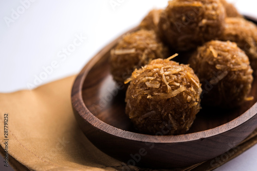 Jaggery coconut Laddoo / Nariyal gur ke laddu, indian sweet food for festivals like rakshabandhan/rakhi pournima