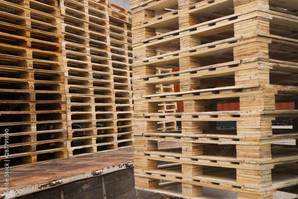 Wooden pallets stack on the truck at the freight cargo warehouse for transportation and logistics industrial