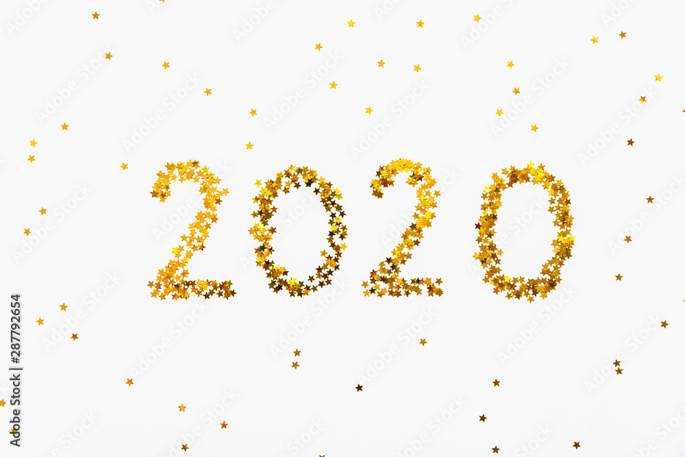 New 2020 Year golden star shaped confetti background. New 2020 Year golden star shaped confetti background.