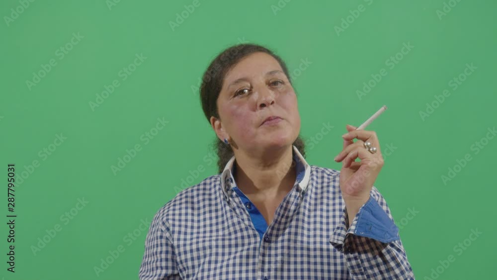 Woman Smoking A Cigarette With Great Joy Woman Smoking A Cigarette With Great Joy