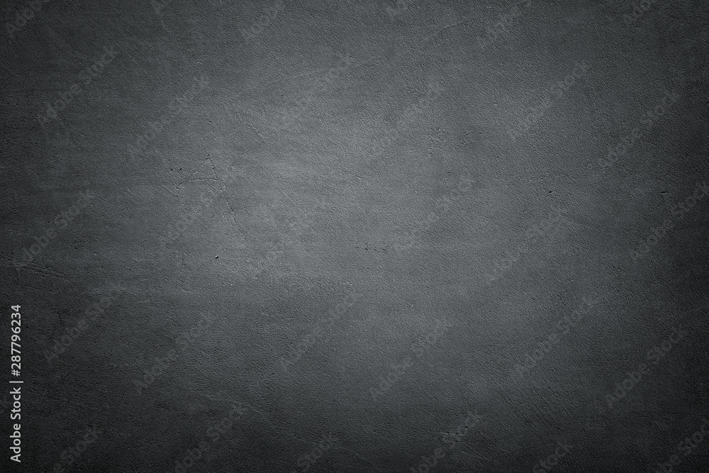 Dark empty concrete wall background with copy space Dark empty concrete wall background with copy space