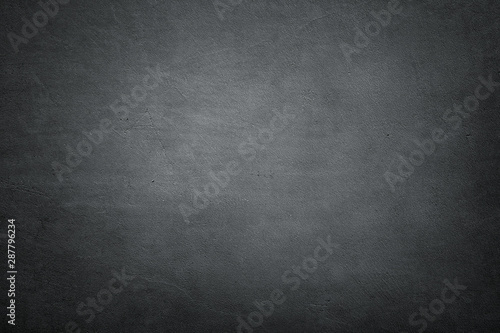 Dark empty concrete wall background with copy space