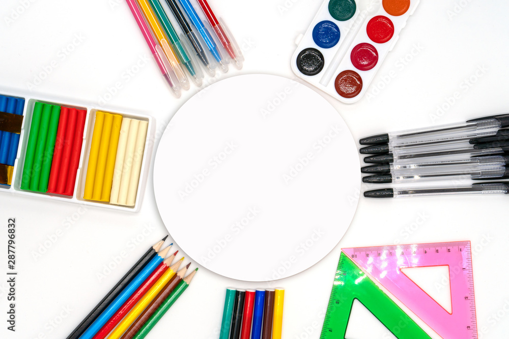 Colorful school supplies in circle arrangement on white background, back to school concept. Sale of school supplies and stationery. round Space for text Colorful school supplies in circle arrangement on white background, back to school concept. Sale of school supplies and stationery. round Space for text