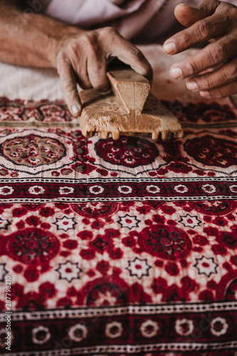 Ajrak  maker hand working on Pattern 