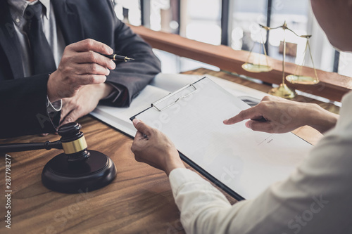 Quadro em tela Male lawyer or judge consult having team meeting with Businesswoman client, Law