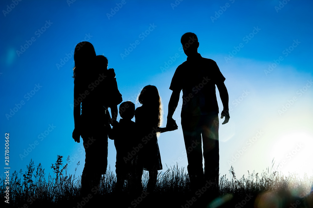 happy family outdoors in the park silhouette happy family outdoors in the park silhouette