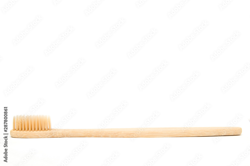 Bamboo toothbrush isolated on the white background Bamboo toothbrush isolated on the white background