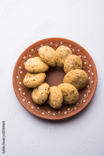 Nan khatai or Nankhatai is an authentic Indian sweet and savory eggless cookie loaded with dry fruits  photo