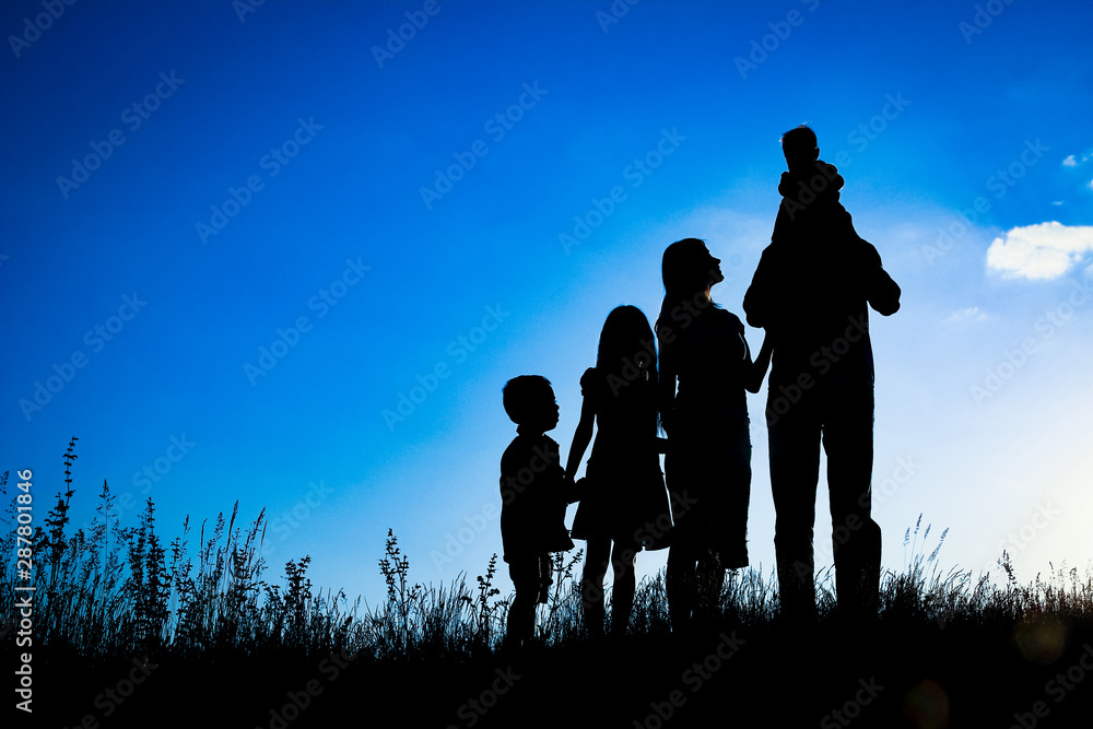 happy family outdoors in the park silhouette happy family outdoors in the park silhouette