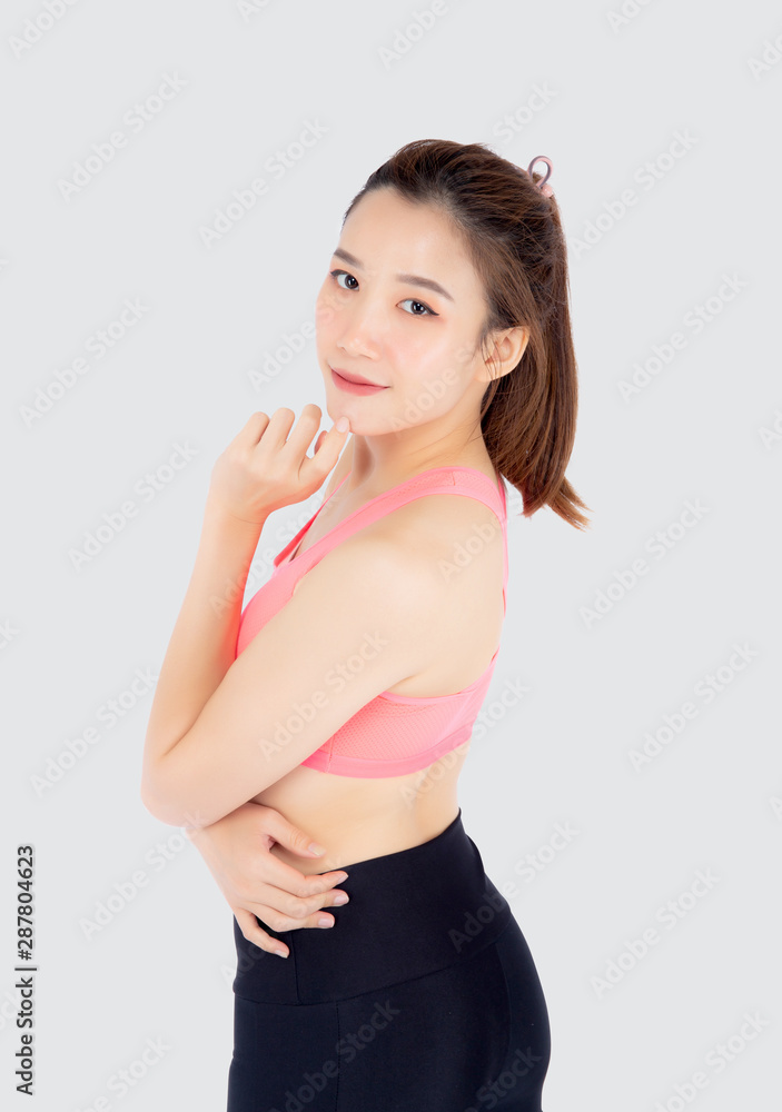 Beautiful portrait young asian woman in sport clothes with satisfied and confident isolated on white background, asia girl cheerful have shape and wellness, exercise for fit with health concept. Beautiful portrait young asian woman in sport clothes with satisfied and confident isolated on white background, asia girl cheerful have shape and wellness, exercise for fit with health concept.