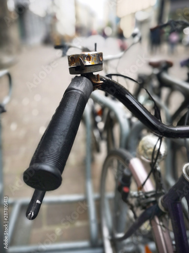 Bicycle handlebar, vintage bike parked in Ghent