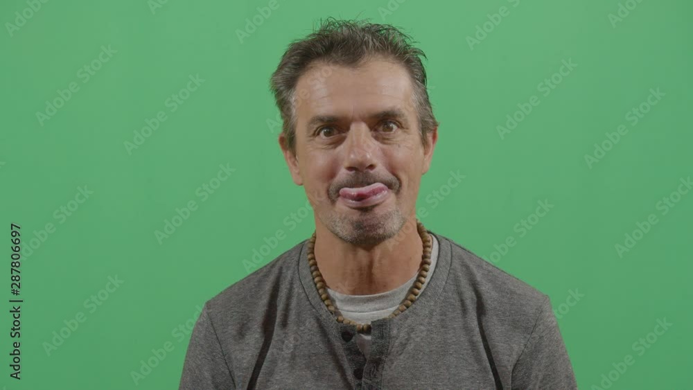 Adult Man Trying To Reach The Nose With The Tongue Starting From A Relaxed State And Going Into An Unpredictable Funny Face Adult Man Trying To Reach The Nose With The Tongue Starting From A Relaxed State And Going Into An Unpredictable Funny Face