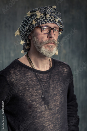 Old fashion man, good looking. Egyptian scarf and glasses