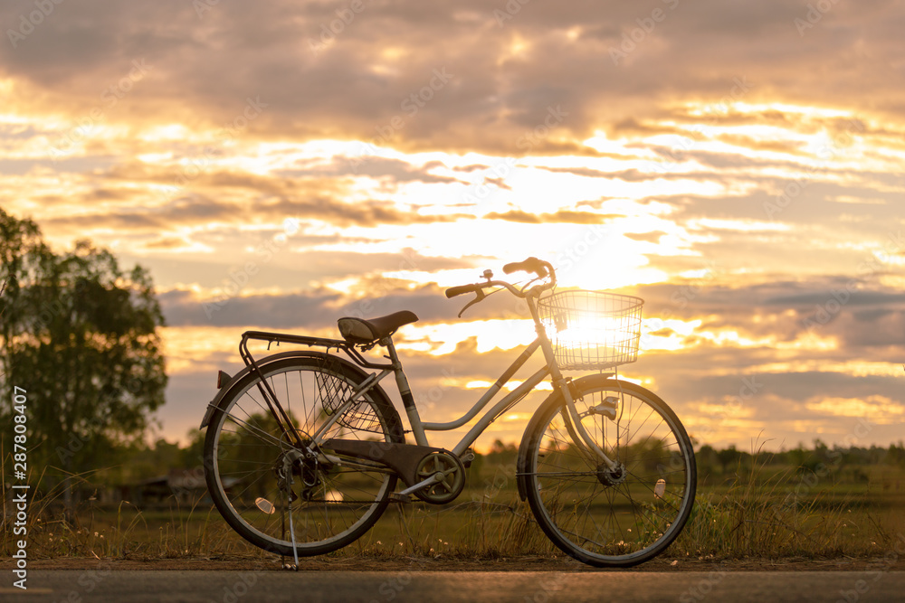 bicycle on sunset background