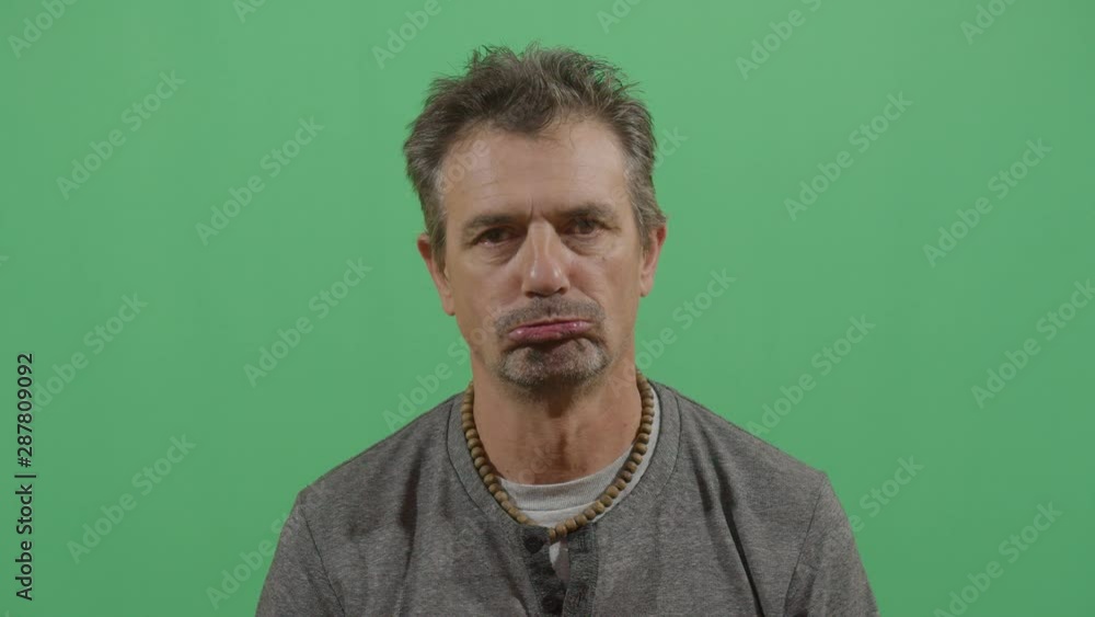 Facial Expression Of A Adult Man Pouting Facial Expression Of A Adult Man Pouting