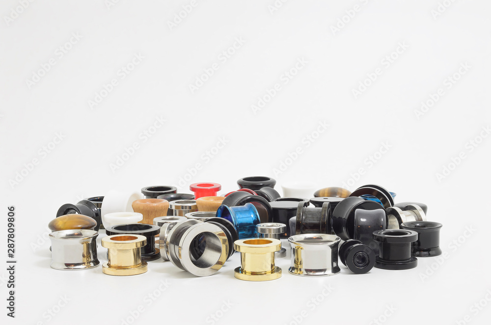 Ear stretchers plugs and ear tunnels. Varied types, colors and sizes