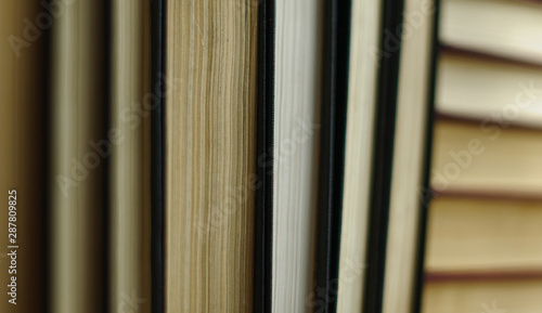 Close up of old stacked books