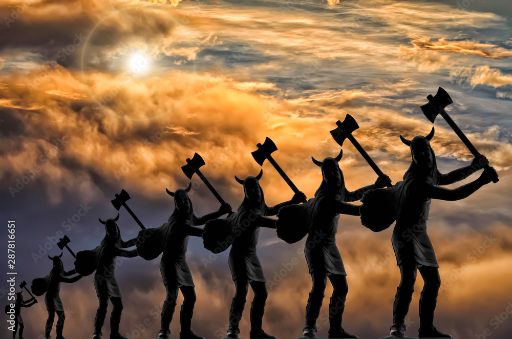 Seven silhouettes of attacking Vikings (plastic toy soldiers) with axes arrayed in a line, stormy sky with clouds, bright sun, vanishing point effect, Old Norse, Ragnarok, Valhalla and Odin themes