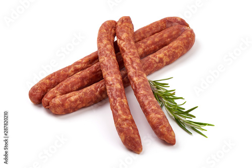 Long thin dry sausages, isolated on white background