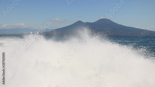 Wake of a hydrofoil in the Gulf of Naples. Mediterranean sea. A white foam made from the speed of the ship.