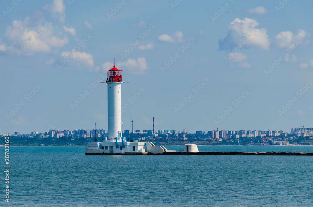 Seascape with lighthouse on the Black Sea in Odesa during the summer season