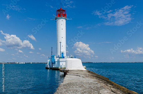 Seascape with lighthouse on the Black Sea in Odesa during the summer season