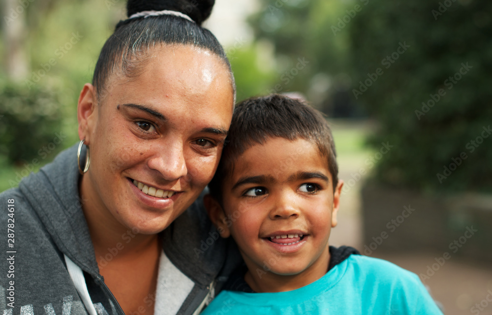 Selective focus of aboriginal boy and woman Selective focus of aboriginal boy and woman