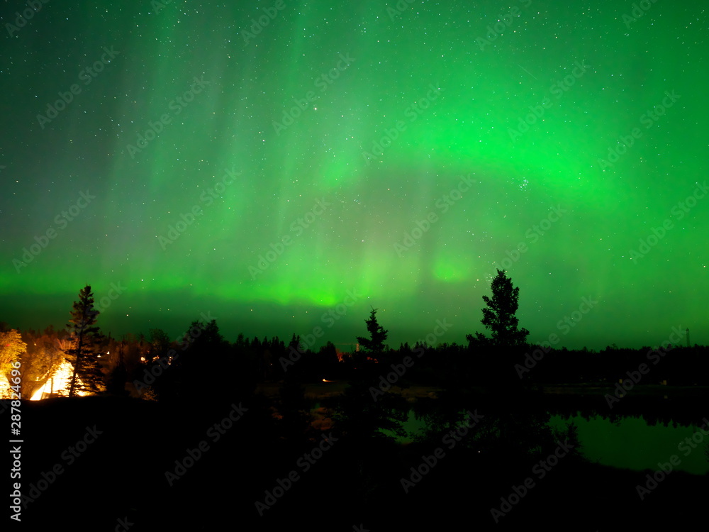 Yellowknife,Canada-August, 2019: Aurora borealis or Northern lights observed in Yellowknife, Canada, on August, 2019