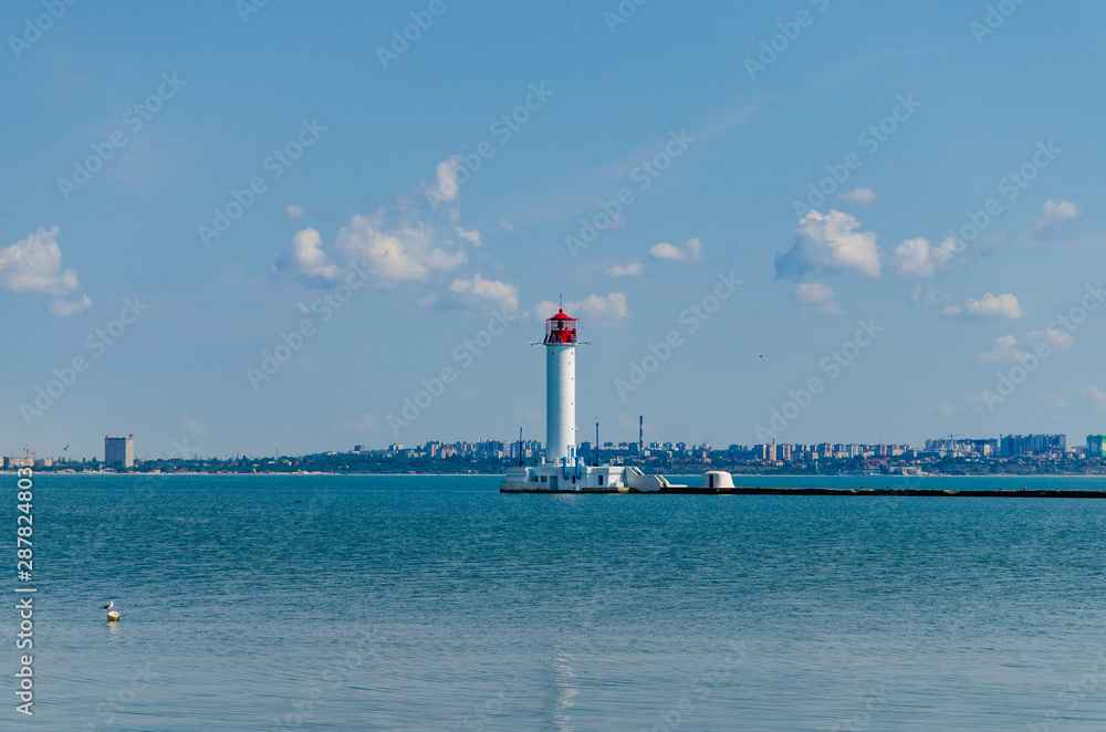 Fototapeta premium Seascape with lighthouse on the Black Sea in Odesa during the summer season