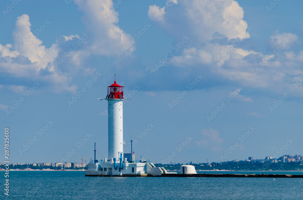 Seascape with lighthouse on the Black Sea in Odesa during the summer season