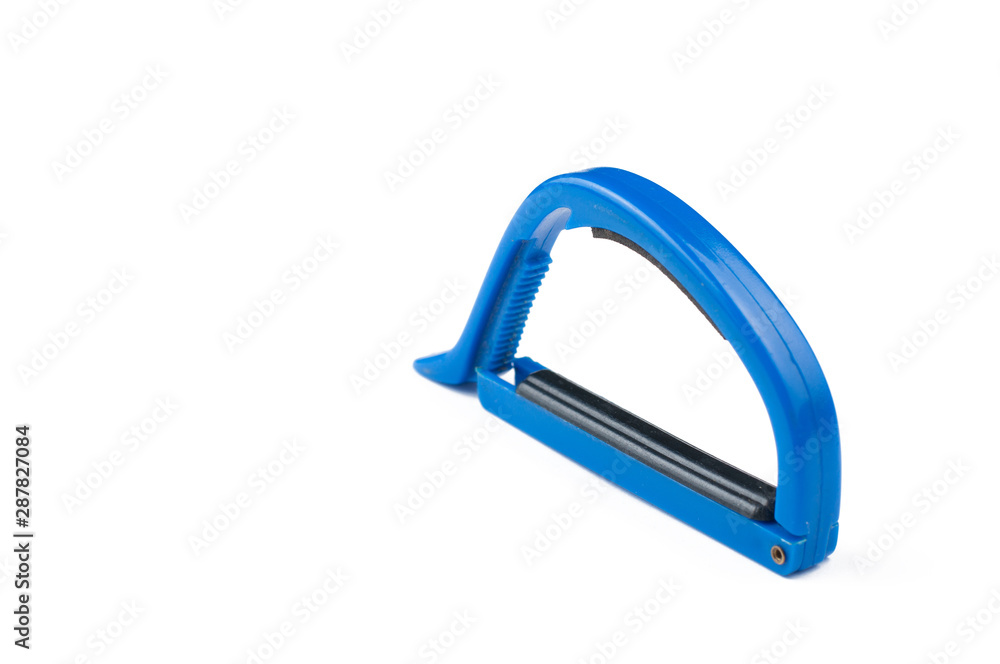 Blue guitar capo isolated on white background.Copy space Blue guitar capo isolated on white background.Copy space