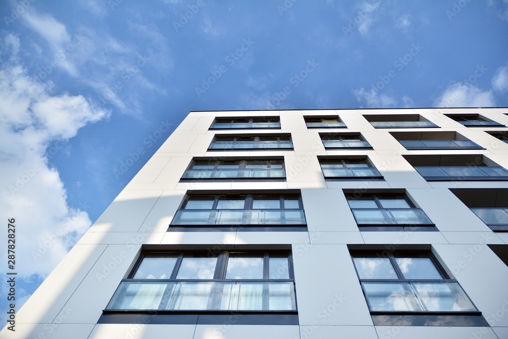 Modern and new apartment building. Multistoried modern, new and stylish living block of flats.