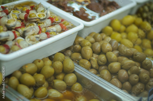 tradition spanish green marinated olives on trays