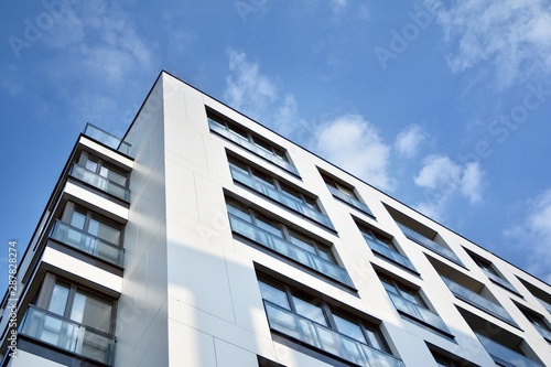 Modern and new apartment building. Multistoried modern, new and stylish living block of flats.