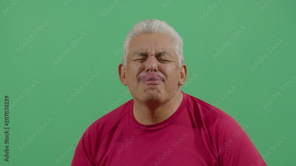 Adult Man Trying To Reach The Nose With The Tongue Starting From A Relaxed State And Going Into An Unpredictable Funny Face Adult Man Trying To Reach The Nose With The Tongue Starting From A Relaxed State And Going Into An Unpredictable Funny Face