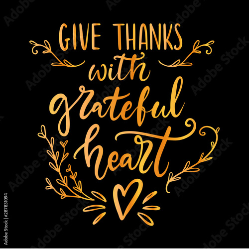 Give thanks with grateful heart hand written lettering quote for Thanksgiving cards, posters, banners on black background