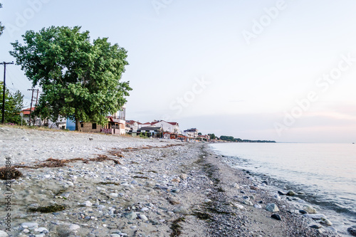 Sunrise in the early morning hours in the village Leptokarya, Greece photo