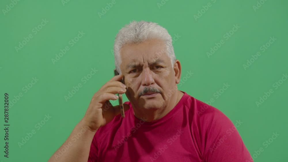 Adult Man Talking On Mobile Phone Pretending To Be In A Real Conversation Adult Man Talking On Mobile Phone Pretending To Be In A Real Conversation